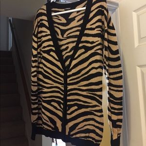 Woman’s express sweater size L.